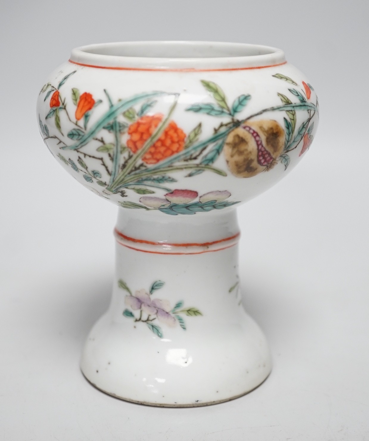 A 19th century Chinese stem cup, painted with flowers and fruit 12cm